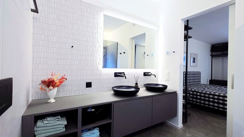 3.5-Zimmerwohnung mit grenzenloser Aussicht und zeitloser Architektur (7)