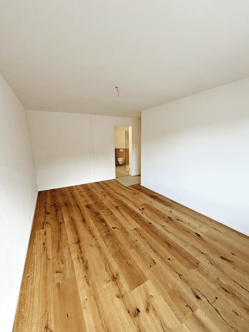 Schlafzimmer mit Bad en Suite - Musterwohnung