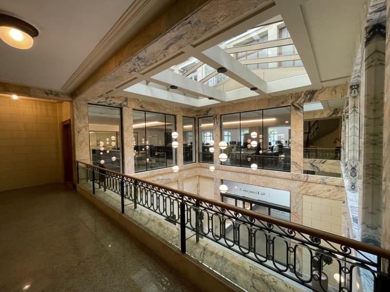marble walls, decorative columns, glass windows, railings, glass ceiling