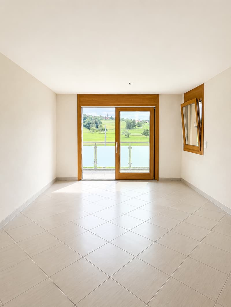 "Romont – 2.5 pièces moderne avec grand balcon de 15.7 m² et parking souterrain (1)