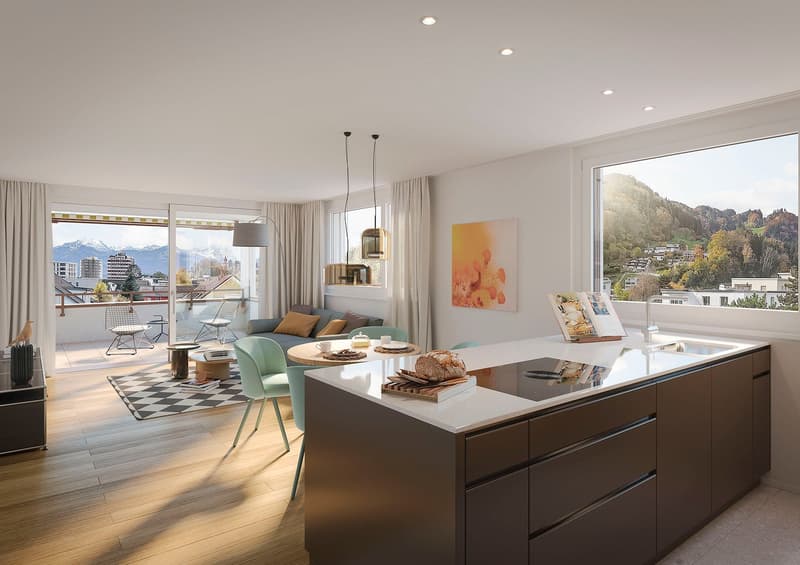Open plan living room and kitchen, large windows, balcony, modern furniture, wooden floor, kitchen island, dining table, couch, artwork, view of mountains