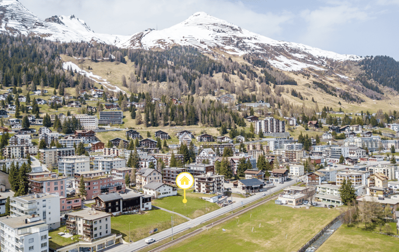 Exklusives Grundstück mit Mehrfamilienhaus in Davos Dorf (1)