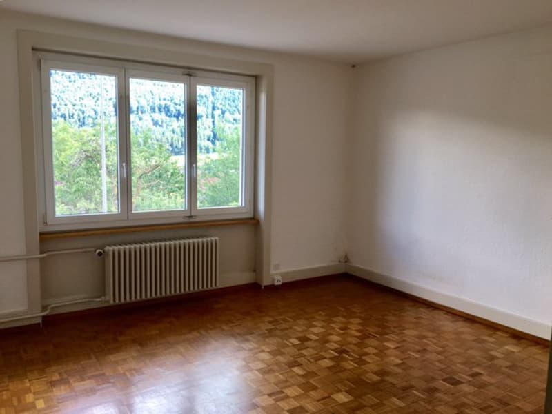 Charmant appartement de 3 pièces au rez-de-chaussée avec parquet d'... (4)