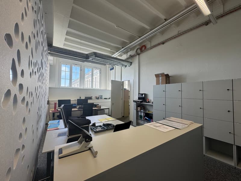 desks, monitors, storage cabinets, lamps, boxes
