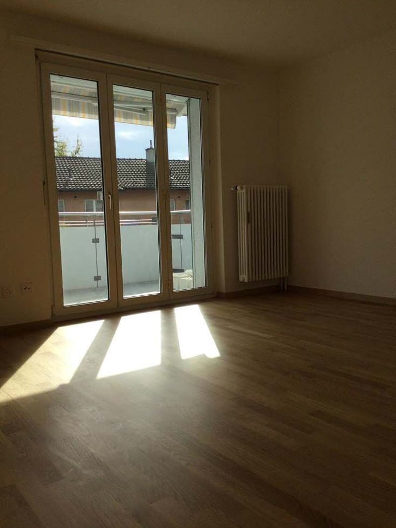 Wohnzimmer mit Balkon