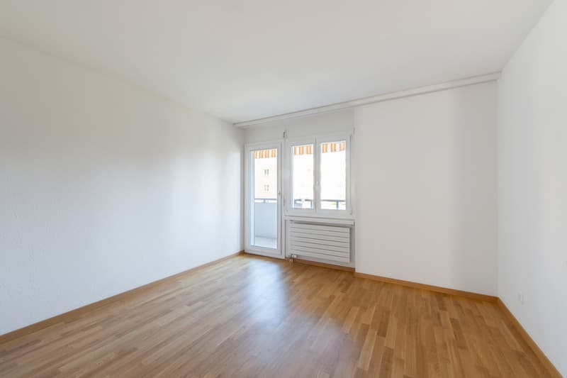 Schlafzimmer mit Balkonzugang