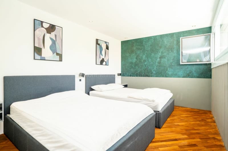 Elegante 10-Zimmer Villa mit aussergewöhnlicher Architektur (31)