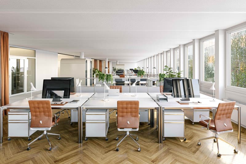 Office space, modern decor, wood flooring, large windows, metal rails, office furniture, computer, lamps