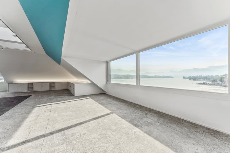 high ceiling, floor to ceiling windows, empty room, water view