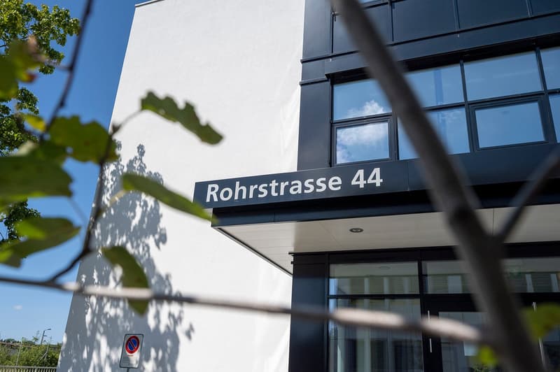 Modern multi-story building with large windows, located on Rohrstrasse 44 street