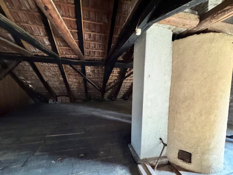 wooden ceiling, brick fireplace, wooden floor