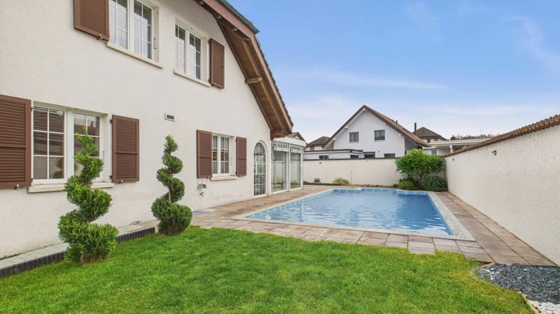 Maison familiale harmonieuse avec jardin, piscine et confort réfléchi (3)