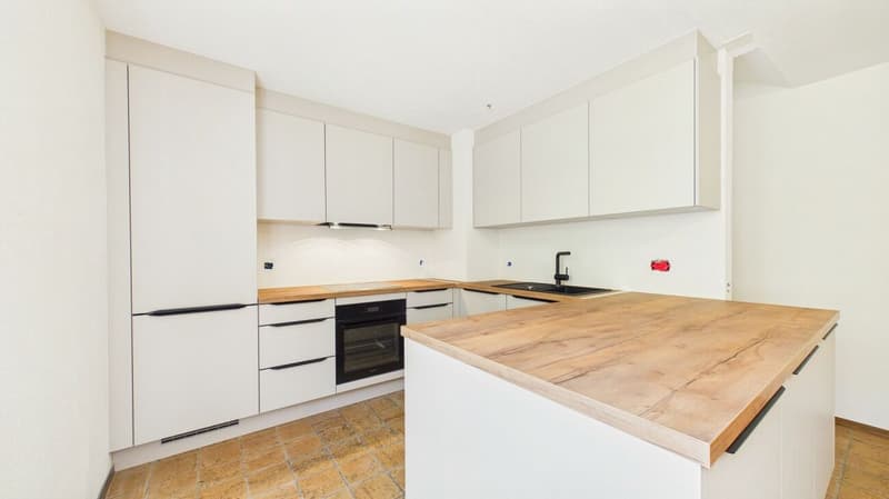 Charmantes 4.5-Zimmer-Doppeleinfamilienhaus mit neuer Küche, Garten und Cheminée (6)