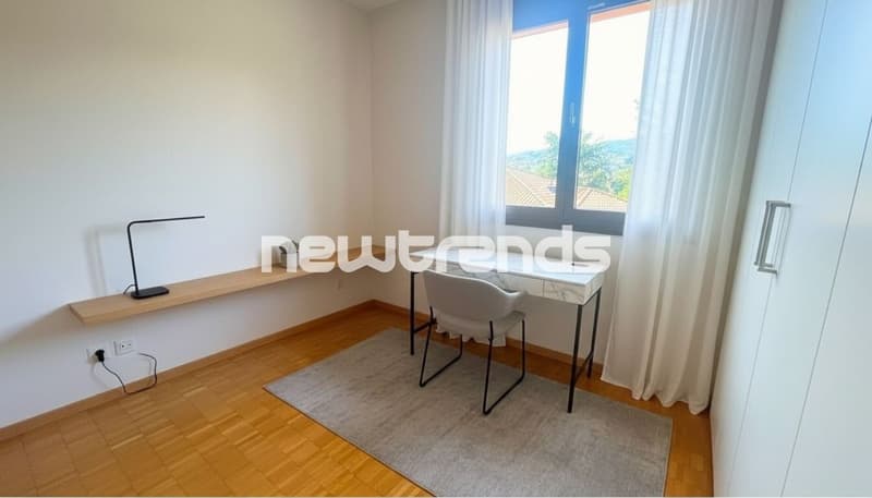 AMPIO 2.5 CON TERRAZZINO E PARZIALE VISTA LAGO CON POSTO AUTO (8)