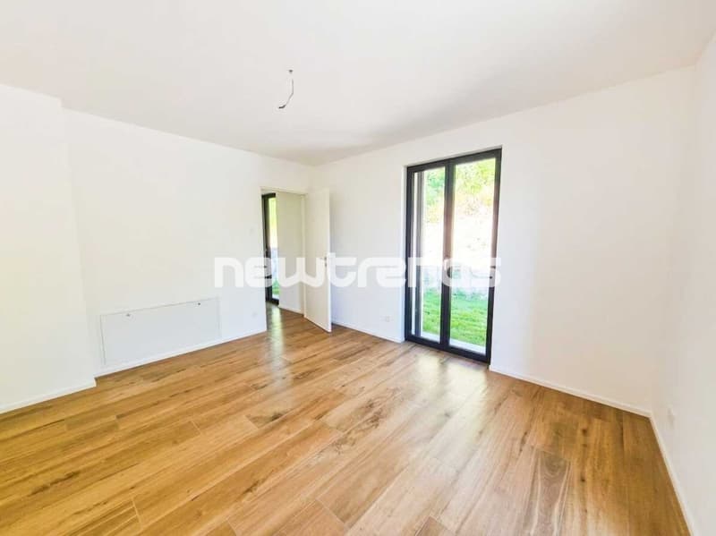 Pura-Caslano: affittasi nuovo 2.5 locali con giardino e patio (1)