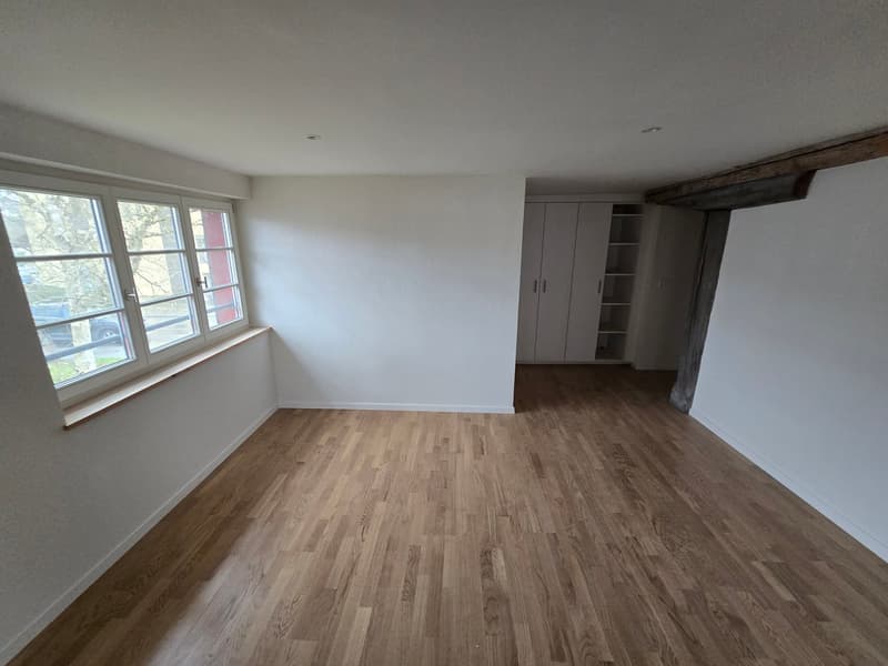empty room, hardwood floor, white walls, large windows, wardrobe