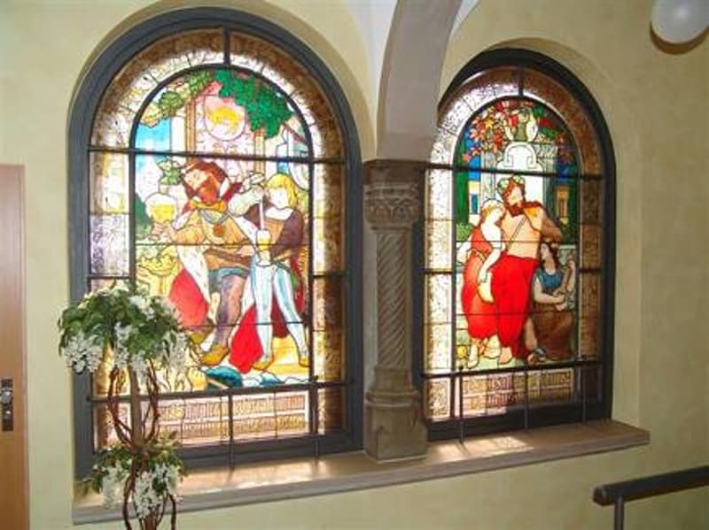 stained glass windows, wooden door, flower vase, yellow wall