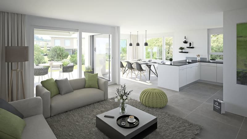 Open-concept living room and kitchen with large windows, sliding glass doors leading to a balcony or terrace, gray sofa with green accent pillows, coffee table, dining table and chairs, modern kitchen with white cabinets and countertops, pendant lighting,