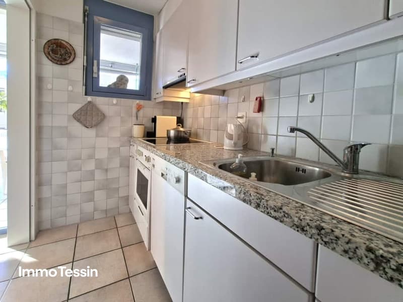 Wohnen zwischen See und Stadtzentrum Wohnung mit privatem Garten in Locarno 7