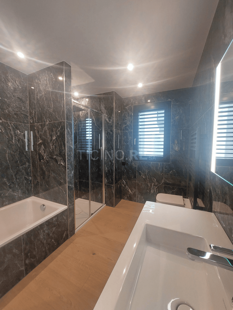 Montagnola – Elegante 2.5 locali con giardino privato e vista lago (9)