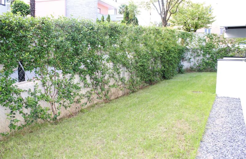 Appartamento elegante con giardino privato a Lugano Pregassona (13)