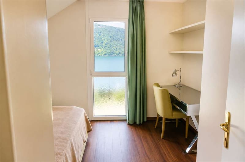 Esclusivo duplex di 4.5 locali con giardino privato e spettacolare vis (7)