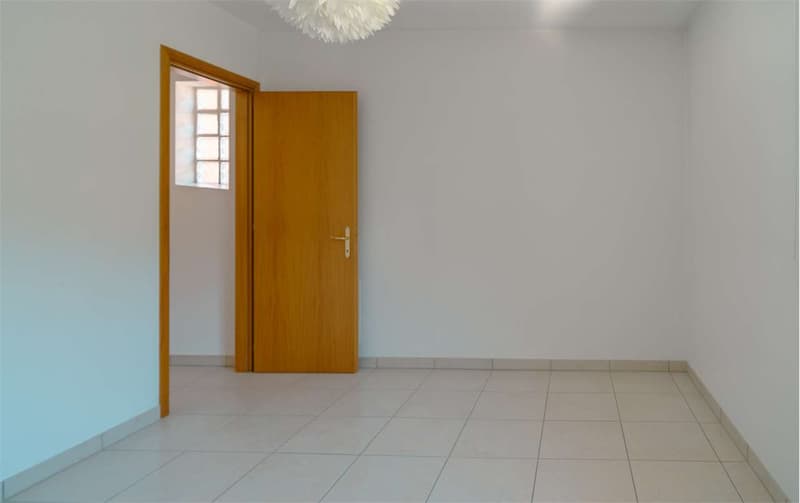 Vacallo: casa contigua con giardino privato (12)