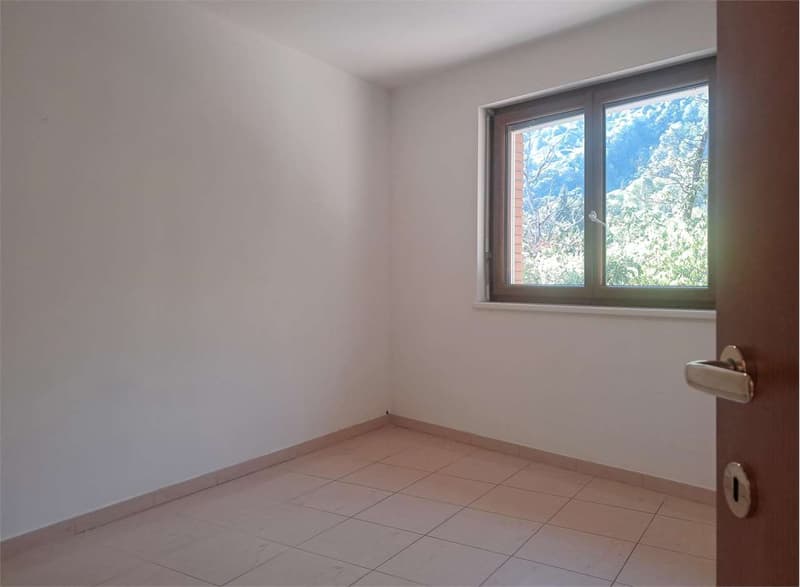 Bioggio: spazioso attico di 4,5 locali con vista lago in casa bifamili (7)