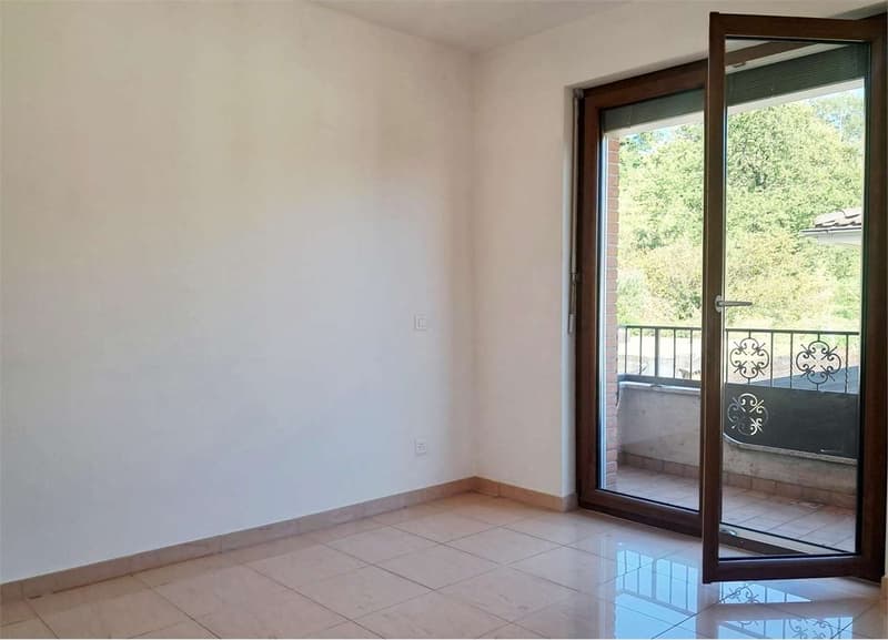 Bioggio: spazioso attico di 4,5 locali con vista lago in casa bifamili (5)