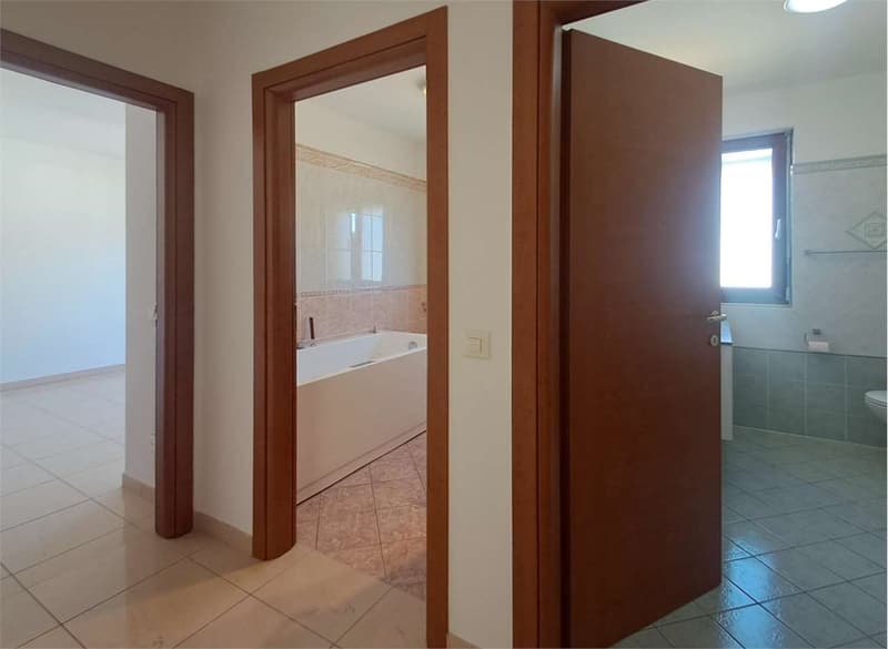 Bioggio: spazioso attico di 4,5 locali con vista lago in casa bifamili (12)