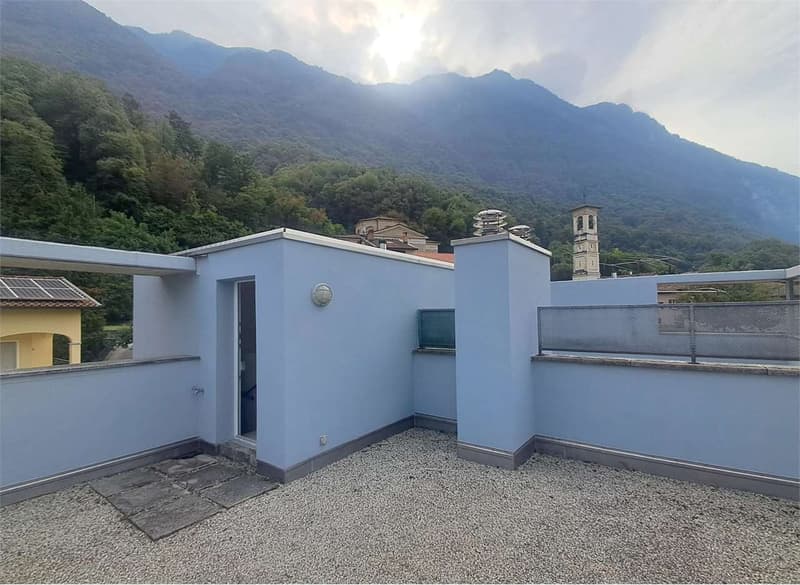 Melano: piacevole maisonette di 3,5 locali con terrazze e parcheggi (11)