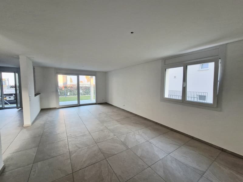 empty room, tile floor, white walls, sliding glass doors, large windows
