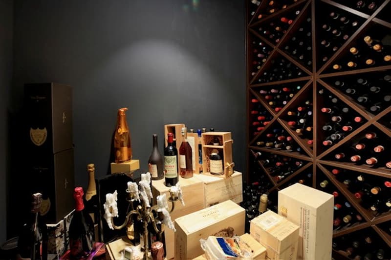 wine rack, many wine bottles, wine boxes, wine barrels