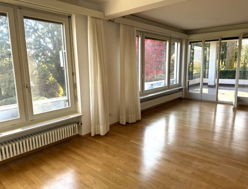 large windows, white curtains, glass sliding doors, wooden floors, sliding windows, radiators, balcony, outdoor view