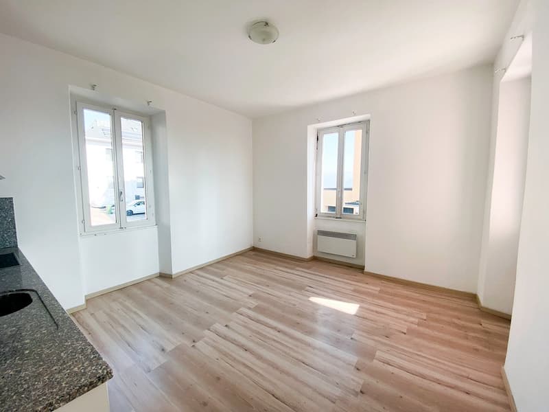kitchen, tiled floor, marble countertop, under cabinet lighting, double windows, heating