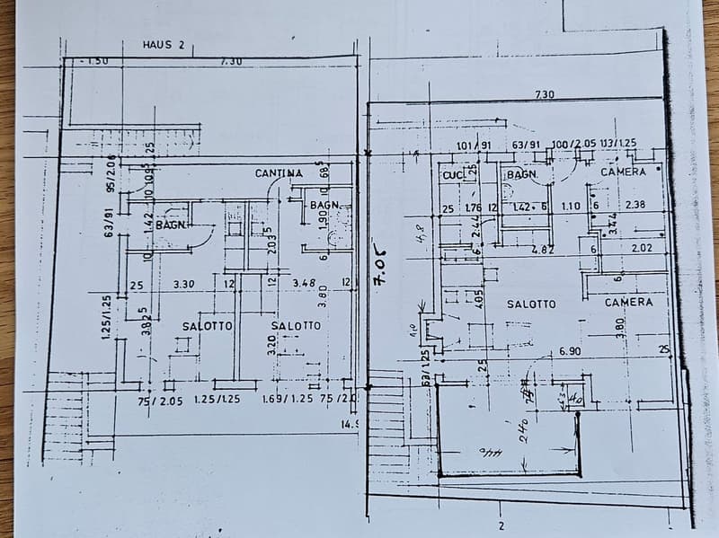 Floor plan with multiple rooms, including living room, kitchen, bedrooms, bathrooms, and storage areas.