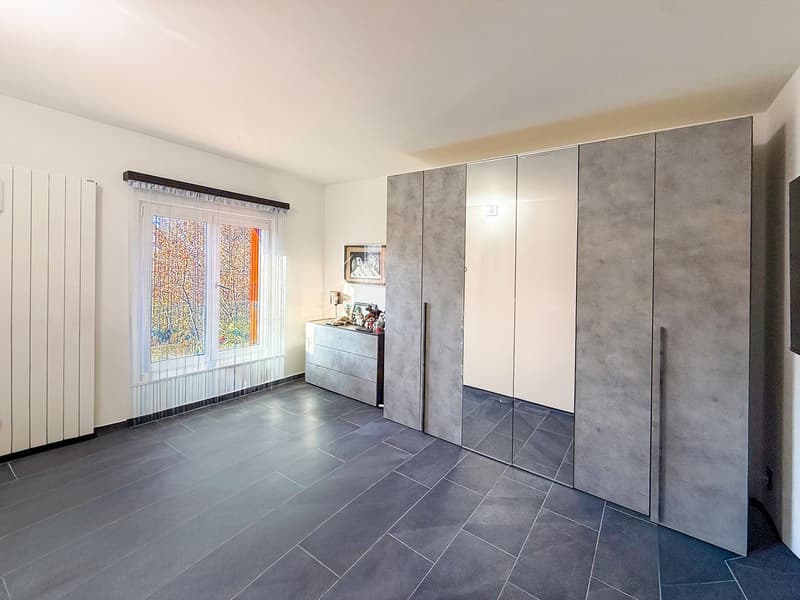 Splendida casa plurifamiliare di 10 locali a Solduno (35)