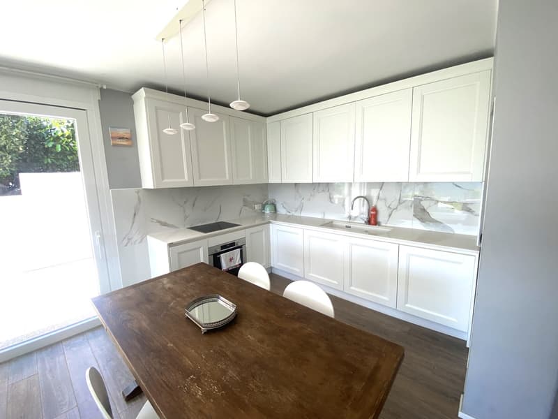 Casa 2,5 locali ristrutturata con vista Ceresio, giardino e parcheggi (7)