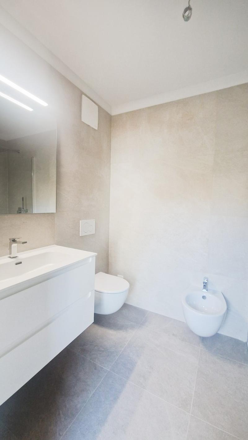 Casa 4,5 locali in contesto bifamiliare con giardino privato. (12)