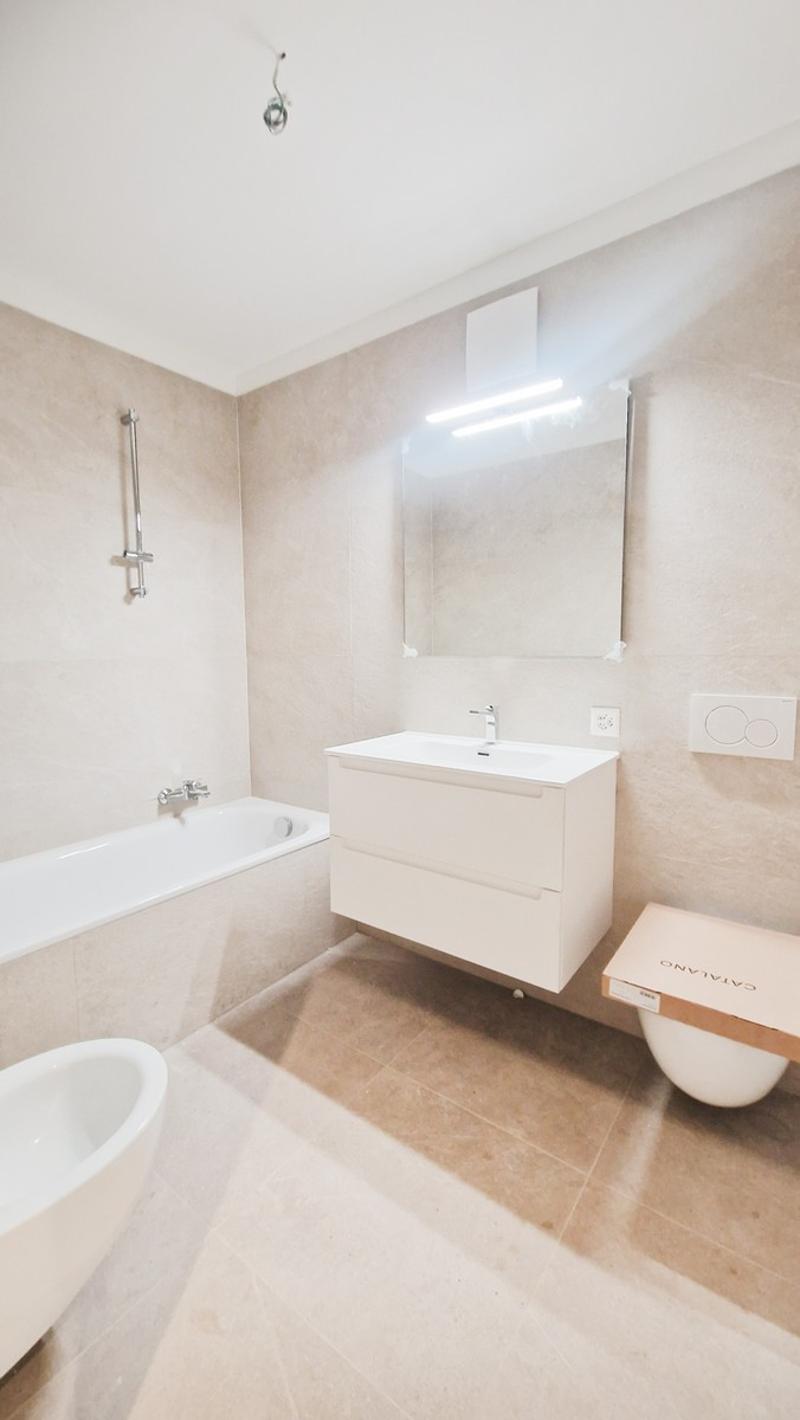 Casa 4,5 locali in contesto bifamiliare con giardino privato. (11)