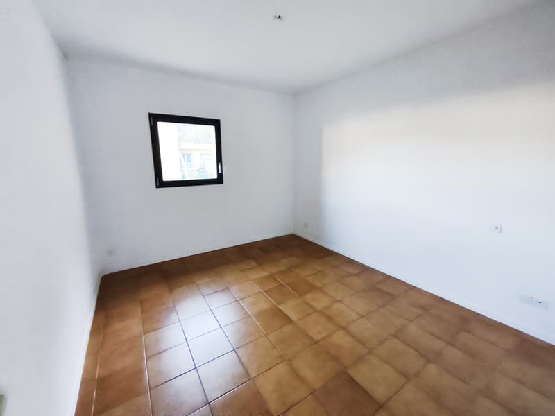 Interessante bifamiliare di due 3,5 con giardino vicino al centro (10)