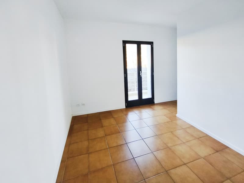 Interessante bifamiliare di due 3,5 con giardino vicino al centro (11)