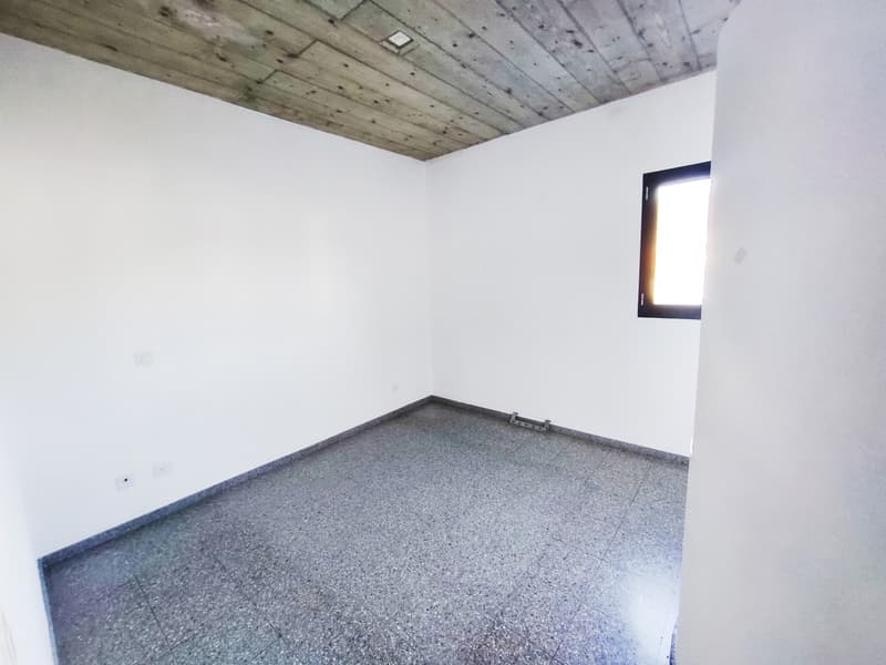 Interessante bifamiliare di due 3,5 con giardino vicino al centro (6)