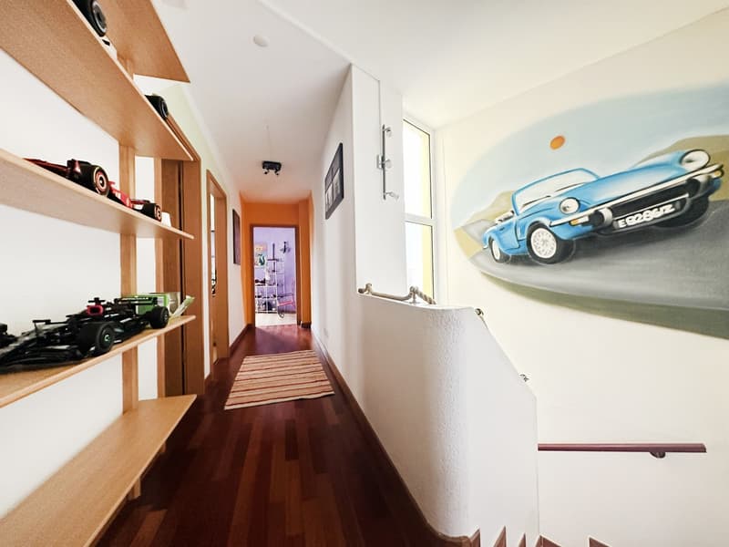 Casa unifamiliare 4,5 locali con ampio giardino recintato a Camorino (8)