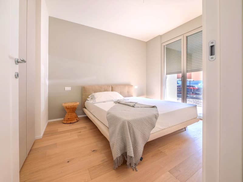 Nuovissimo appartamento 2.5 locali con giardino privato e portico (7)