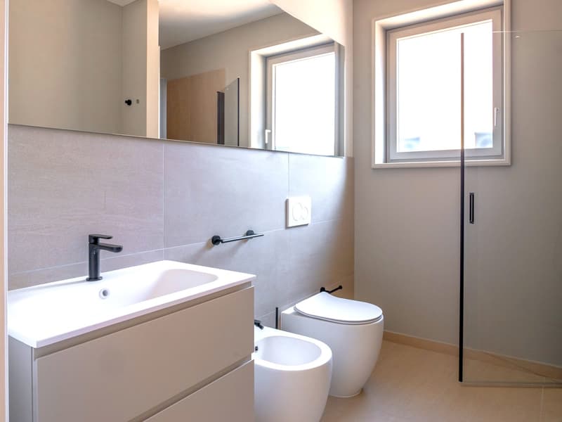Nuovissimo appartamento 2.5 locali con giardino privato e portico (9)