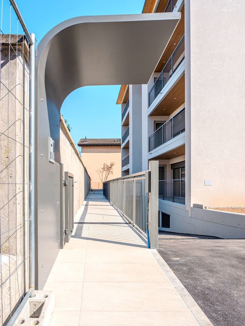 Nuovissimo appartamento 2.5 locali con giardino privato e portico (12)