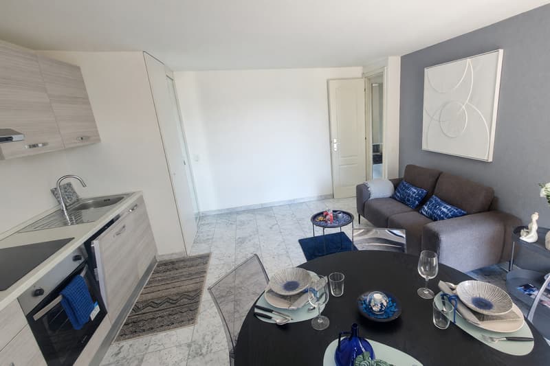 Appartamento 2,5 ristrutturato con balcone e scorcio lago (4)