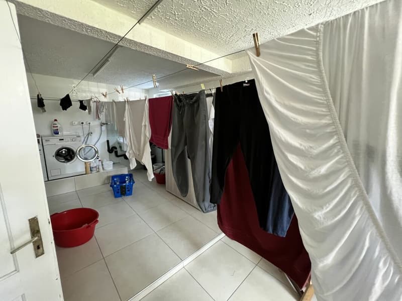 Casa Bifamiliare di 2.5+5.5 locali con terreno (11)
