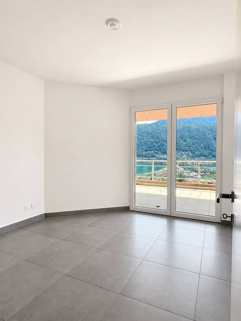 Incantevole appartamento di 3.5 locali con vista lago a Melide (7)